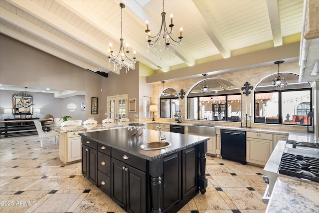 kitchen featuring pendant lighting, dishwasher, a center island, light stone counters, and beamed ceiling