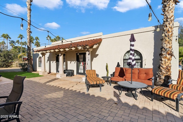 view of patio with an outdoor hangout area