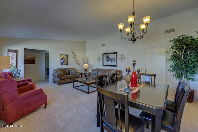 carpeted dining space featuring vaulted ceiling, a textured ceiling, and an inviting chandelier