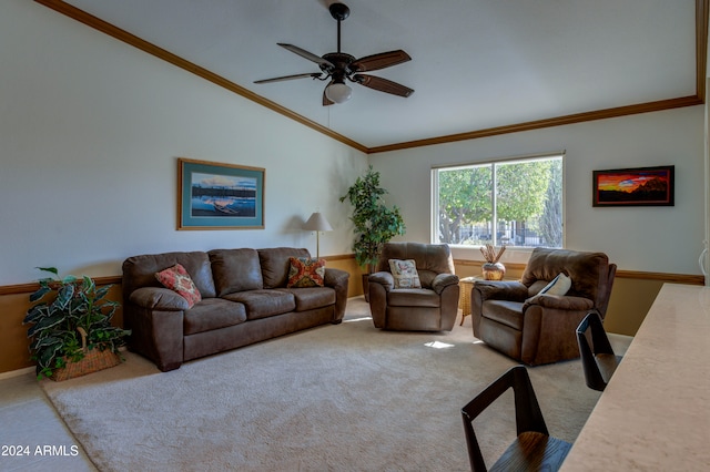 living room featuring ceiling fan, light colored carpet, vaulted ceiling, and ornamental molding