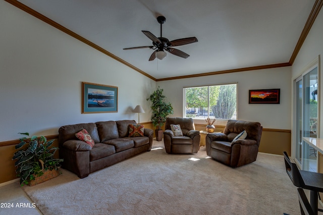 carpeted living room featuring ceiling fan, vaulted ceiling, and ornamental molding