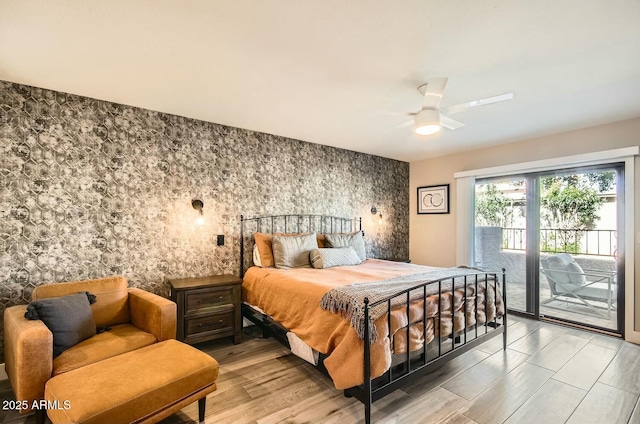 bedroom featuring ceiling fan and access to outside