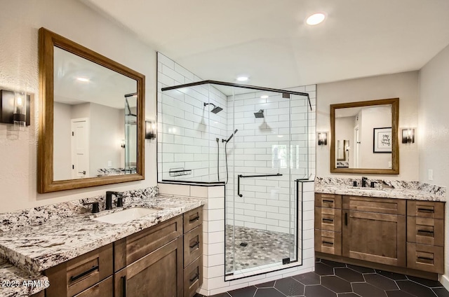 bathroom featuring vanity, tile patterned floors, and an enclosed shower