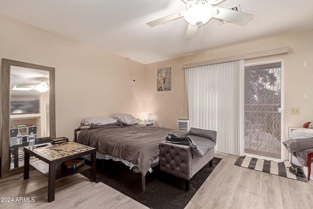 bedroom with wood-type flooring and ceiling fan