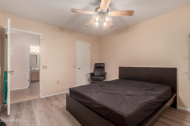 bedroom featuring ceiling fan and light wood-type flooring