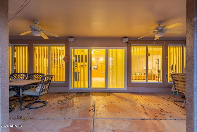 view of patio / terrace featuring ceiling fan