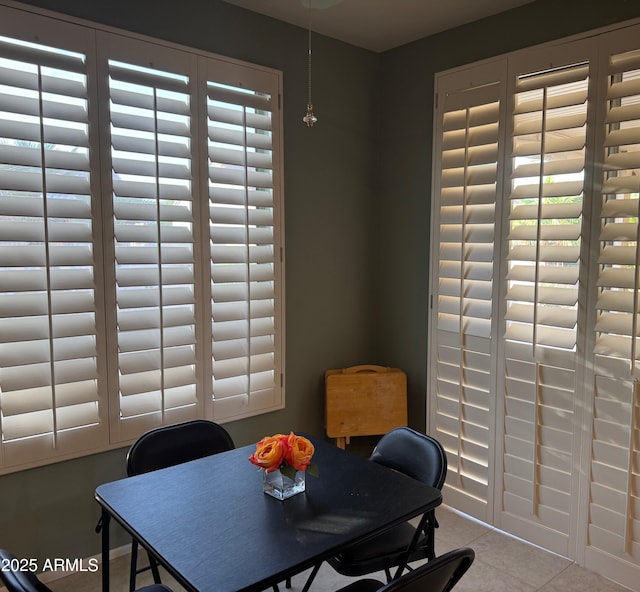 office area featuring plenty of natural light and tile patterned flooring