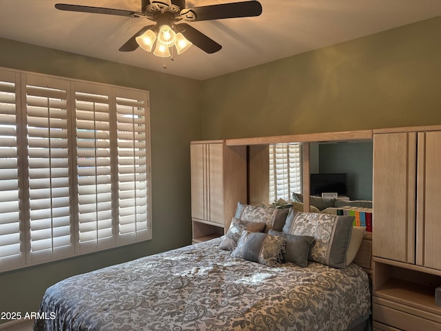 bedroom featuring ceiling fan