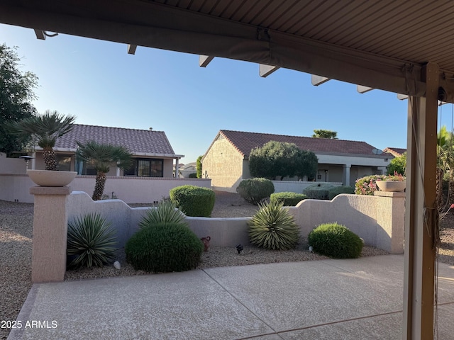 view of patio featuring a fenced front yard