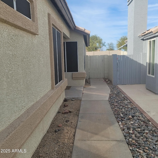 view of home's exterior featuring a patio