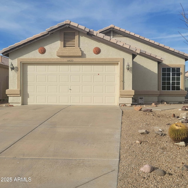 view of front of home with a garage