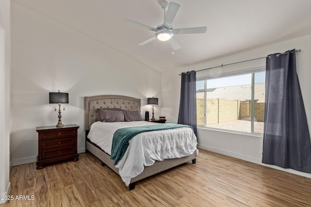 821 E Chicago St, Chandler, AZ 85225 - bedroom featuring baseboards, ceiling fan, vaulted ceiling, and wood finished floors