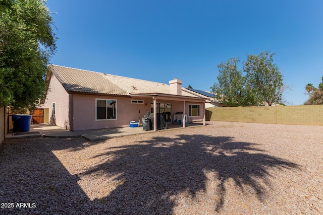 821 E Chicago St, Chandler, AZ 85225 - rear view of property with a tiled roof, a fenced backyard, a patio area, and stucco siding