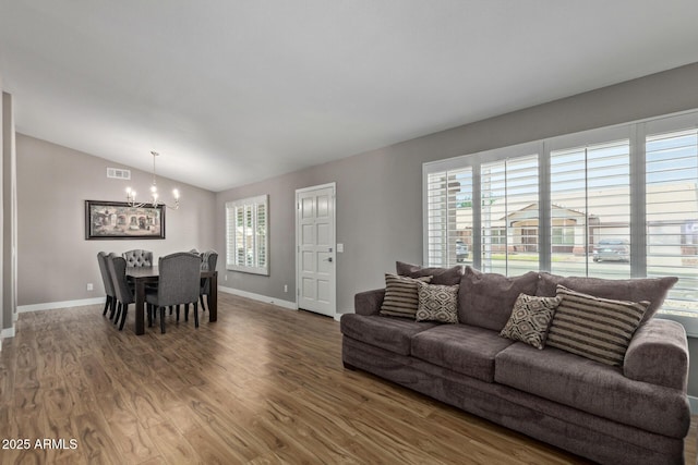 821 E Chicago St, Chandler, AZ 85225 - living area featuring visible vents, a chandelier, a healthy amount of sunlight, and vaulted ceiling