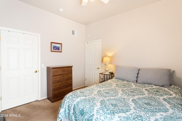 carpeted bedroom with ceiling fan