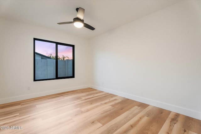 6228 E Blanche Dr, Scottsdale, AZ 85254 - spare room with light wood-type flooring, baseboards, and ceiling fan