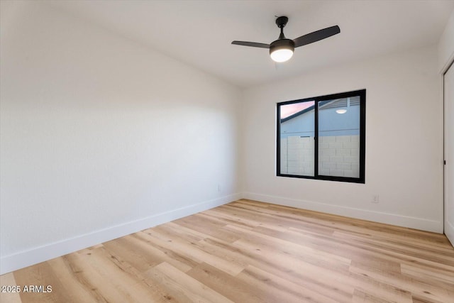 6228 E Blanche Dr, Scottsdale, AZ 85254 - unfurnished room with baseboards, light wood finished floors, and a ceiling fan