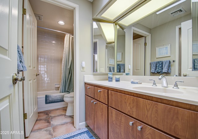 full bathroom with tile patterned flooring, vanity, shower / bathtub combination with curtain, and toilet