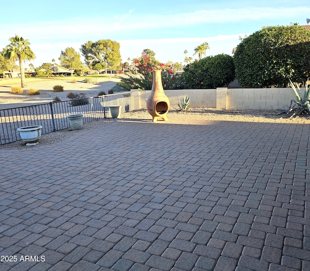 view of property's community featuring a patio