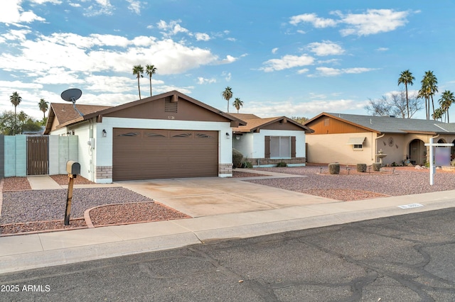 ranch-style house featuring a garage