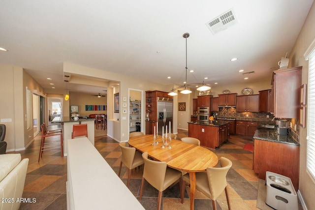 dining room featuring sink