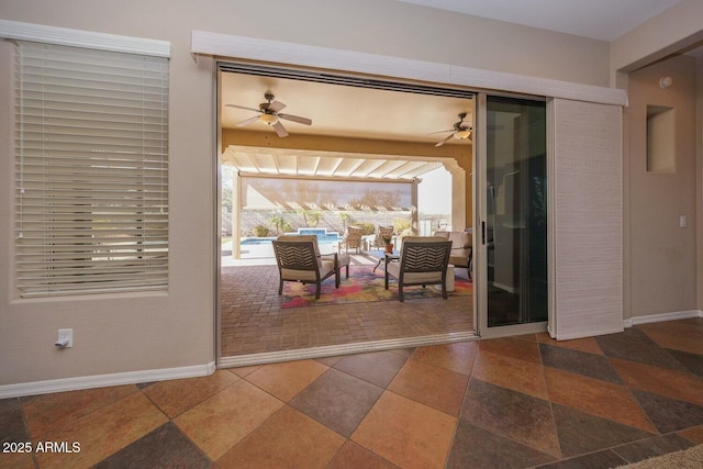 entryway with ceiling fan