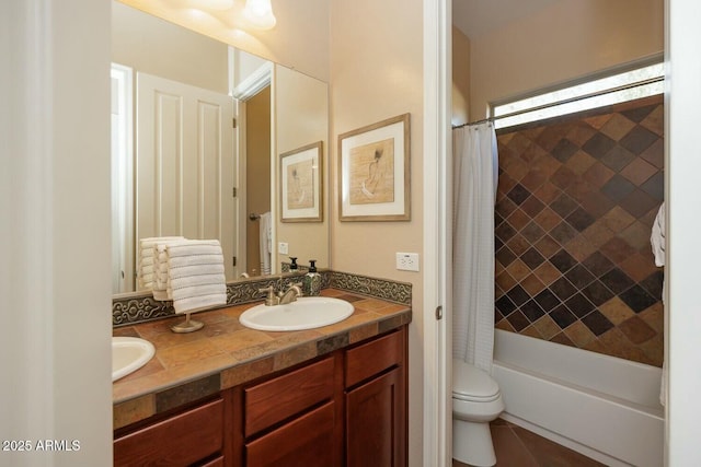 full bathroom featuring vanity, shower / bathtub combination with curtain, and toilet