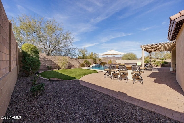 view of yard with a patio area and a pergola