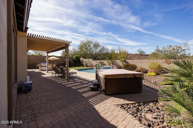 view of patio with a swimming pool with hot tub and a pergola