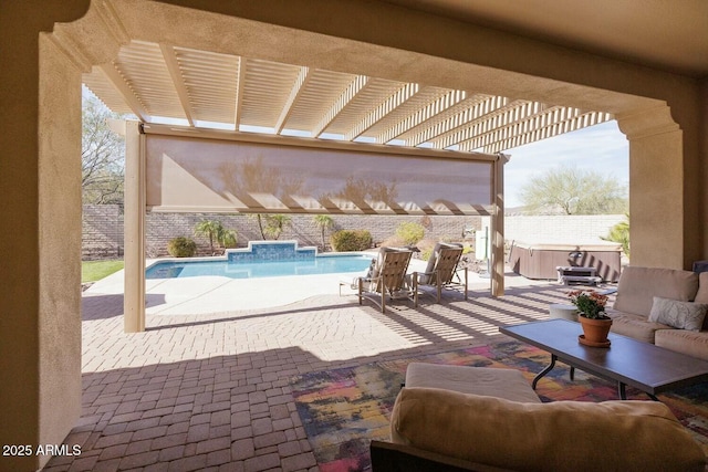 view of patio / terrace featuring a swimming pool with hot tub and a pergola