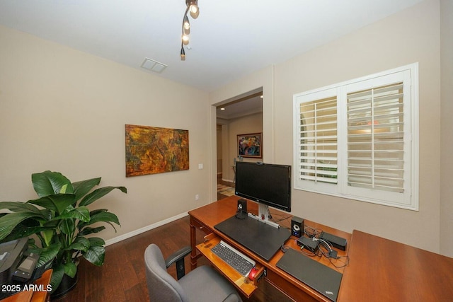 office with dark wood-type flooring