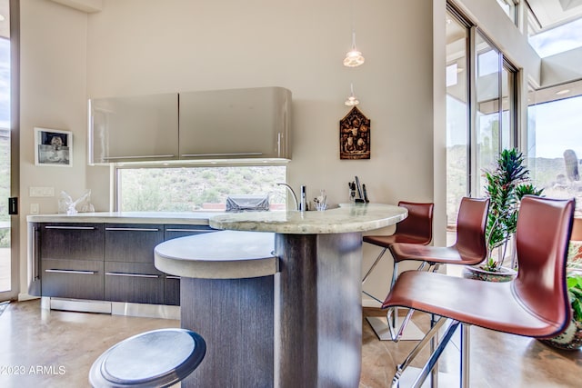 bathroom with a towering ceiling