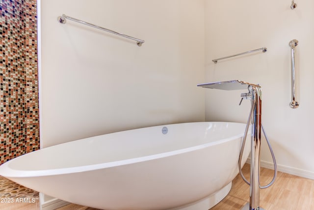 bathroom featuring hardwood / wood-style flooring