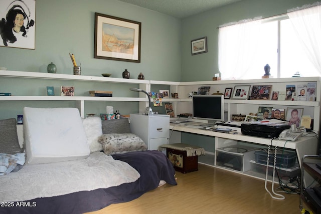 bedroom featuring hardwood / wood-style floors