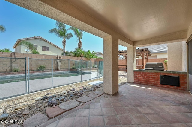 16828 W Windermere Way, Surprise, AZ 85374 - fenced backyard with area for grilling and a patio