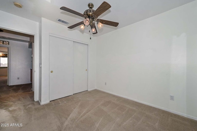 16828 W Windermere Way, Surprise, AZ 85374 - unfurnished bedroom featuring carpet floors, a closet, and ceiling fan