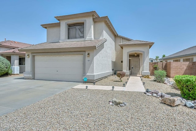 16828 W Windermere Way, Surprise, AZ 85374 - view of front of property with stucco siding, concrete driveway, an attached garage, and a tiled roof