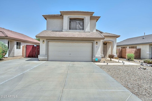 16828 W Windermere Way, Surprise, AZ 85374 - view of front facade with stucco siding, a garage, concrete driveway, and a tiled roof