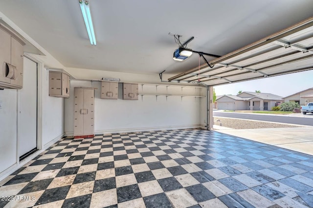 16828 W Windermere Way, Surprise, AZ 85374 - garage featuring a garage door opener and electric panel