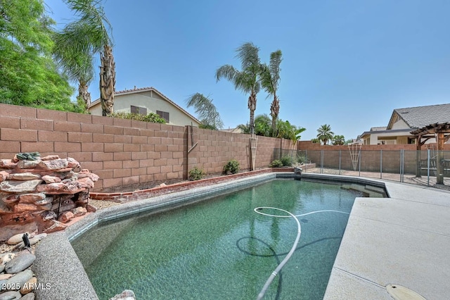 16828 W Windermere Way, Surprise, AZ 85374 - view of swimming pool featuring a fenced backyard