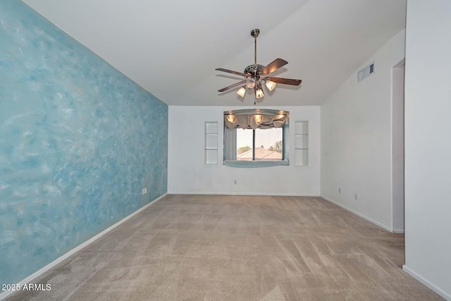 16828 W Windermere Way, Surprise, AZ 85374 - spare room featuring ceiling fan, carpet flooring, lofted ceiling, and wallpapered walls
