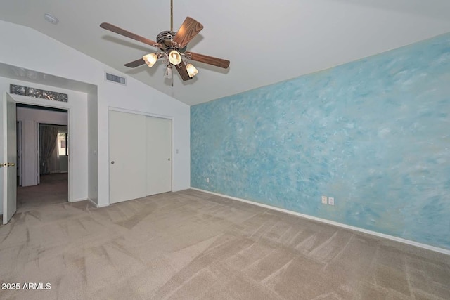 16828 W Windermere Way, Surprise, AZ 85374 - unfurnished bedroom featuring lofted ceiling, carpet flooring, a closet, and a ceiling fan