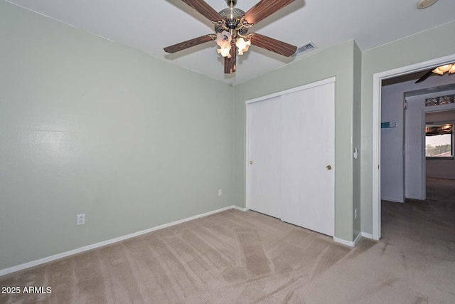 16828 W Windermere Way, Surprise, AZ 85374 - unfurnished bedroom with carpet, a closet, and ceiling fan