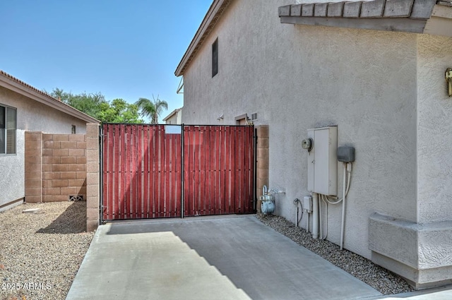 16828 W Windermere Way, Surprise, AZ 85374 - view of home's exterior featuring a gate and stucco siding