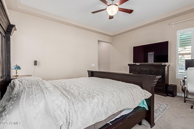 12035 S 186th Ave, Goodyear, AZ 85338 - bedroom with light colored carpet, ceiling fan, and baseboards