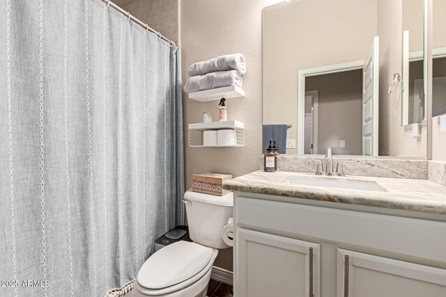 12035 S 186th Ave, Goodyear, AZ 85338 - bathroom with toilet, vanity, and curtained shower