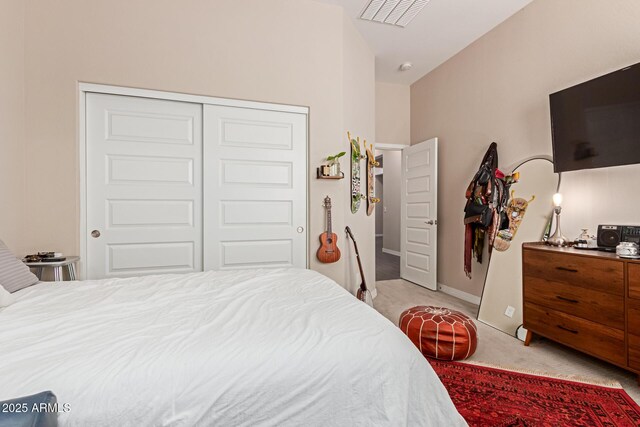12035 S 186th Ave, Goodyear, AZ 85338 - bedroom featuring light colored carpet, a closet, and baseboards
