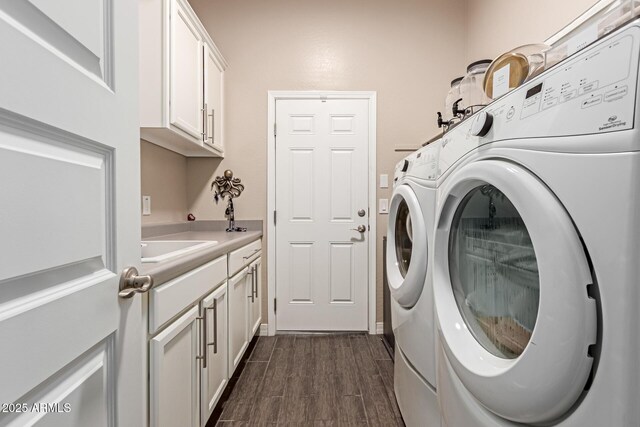 12035 S 186th Ave, Goodyear, AZ 85338 - laundry room with washer and dryer, cabinet space, and dark wood-style floors