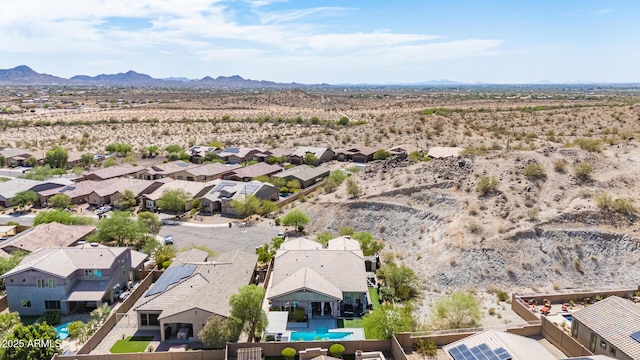 12035 S 186th Ave, Goodyear, AZ 85338 - aerial view of residential area with a desert landscape, a mountain backdrop, and a pool