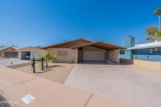 view of front facade with a carport